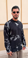 Maglione nero sfrangiato